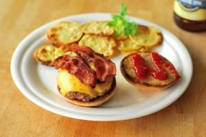 gourmet hamburgers with homemade buns, bacon and cheese 