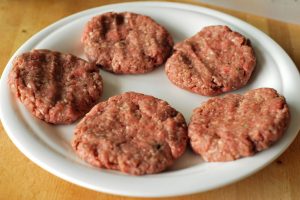5 raw gourmet hamburger patties 
