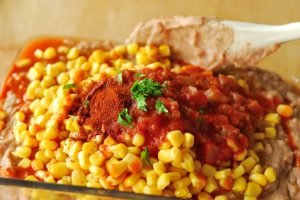 Mexican Casserole from A Duck's Oven. This simple and filling casserole is made with rice, refried beans, ground beef, corn, crushed tortilla chips, and lots of seasonings!