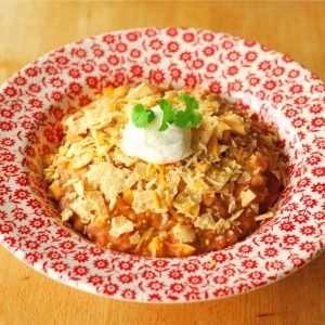 Mexican Casserole from A Duck's Oven. This simple and filling casserole is made with rice, refried beans, ground beef, corn, crushed tortilla chips, and lots of seasonings!