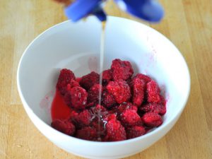 Raspberry Sun Tea and To-Go Mason Jars from A Duck's Oven. Delicious sun tea mixed with a raspberry puree, lemon, and honey makes a very refreshing beverage!