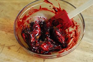 Blackberry Chipotle Hot Wings from A Duck's Oven. A twist on the traditional hot wing by using a homemade blackberry chipotle sauce!