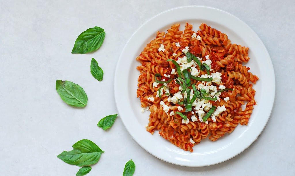 Meaty Fusilli with Basil and Feta from A Duck's Oven. Our absolute favorite pasta! Fusilli in a tomato sauce with ground beef and sausage, topped with fresh basil and feta cheese.