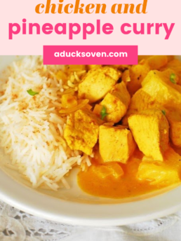 Chicken and Pineapple Curry with white rice on a white plate.