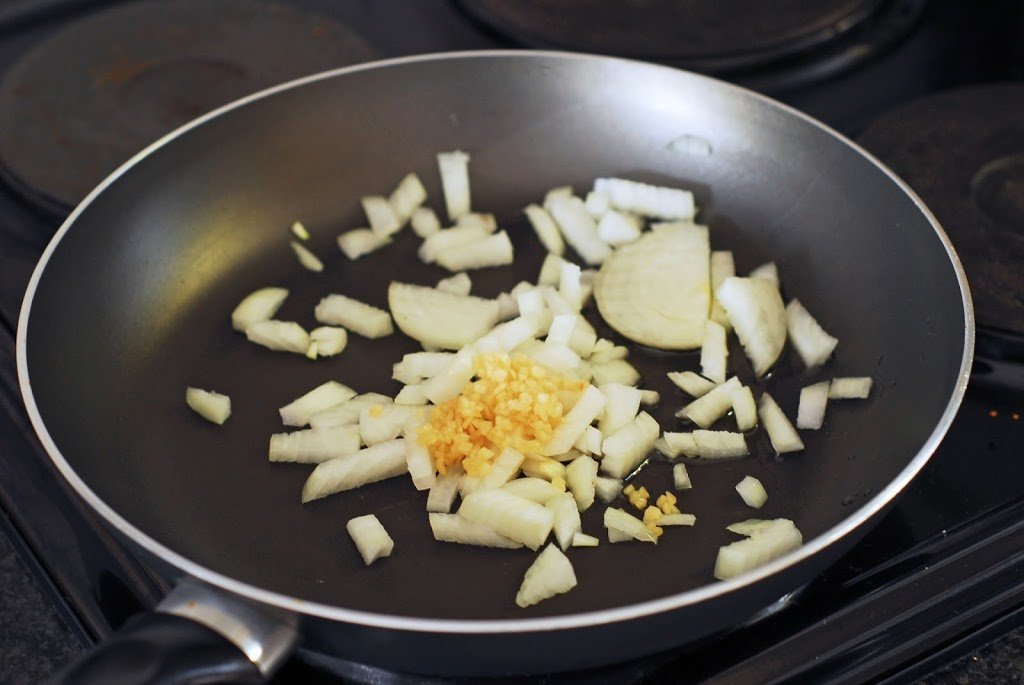 Onions and garlic in saute pan.