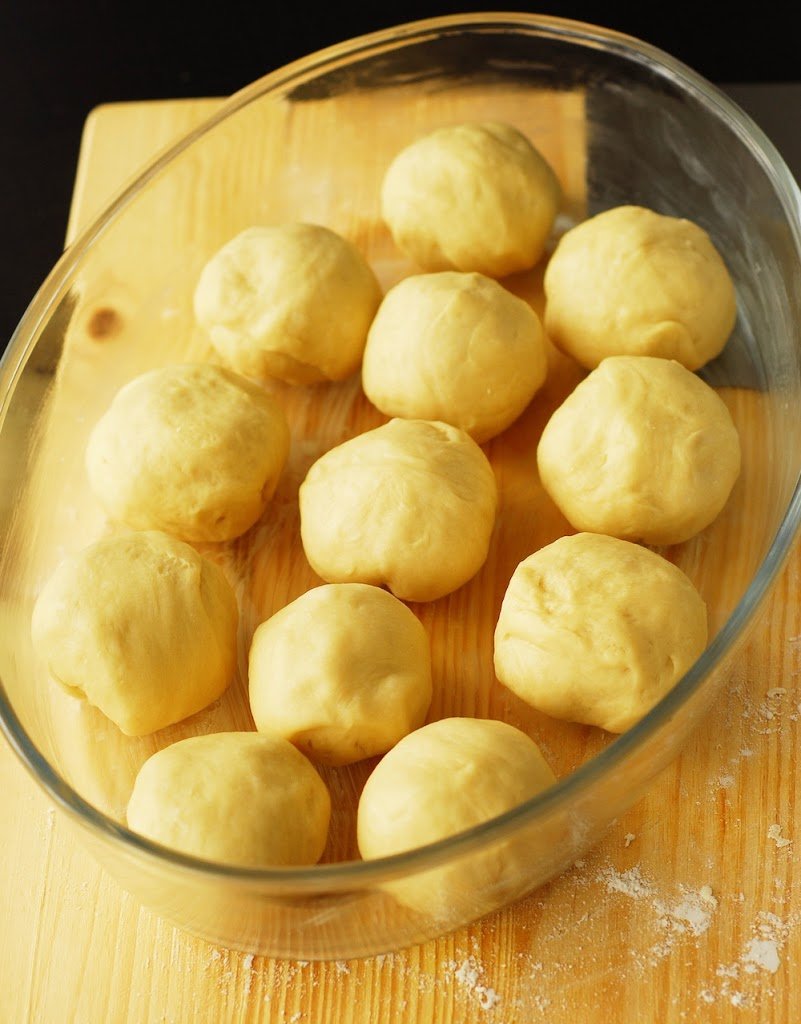 12 raw rolls in glass baking dish