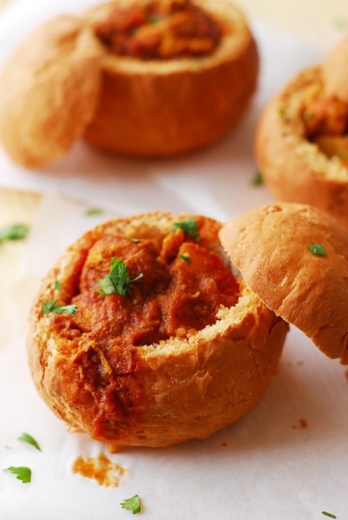 Curry in a Bread Bowl (Bunny Chow) from A Duck's Oven. This street food from Durban, South Africa is hollowed out bread filled with a spicy curry! 