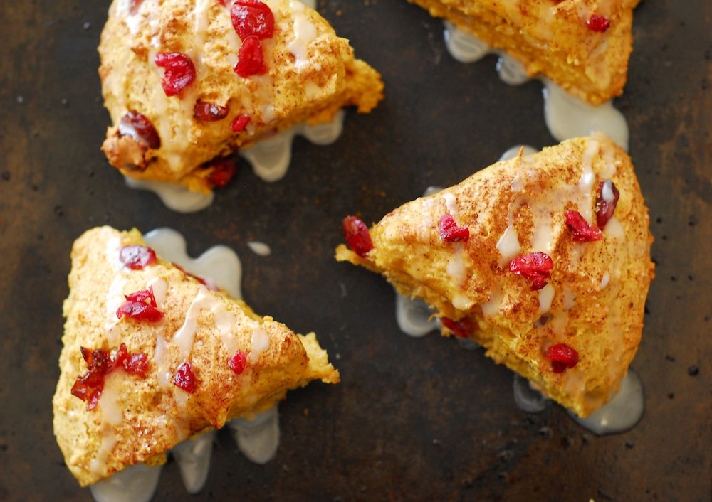 Pumpkin Cranberry Scones from A Duck's Oven. Scones packed with plenty of pumpkin, fall spices, and tart cranberries!