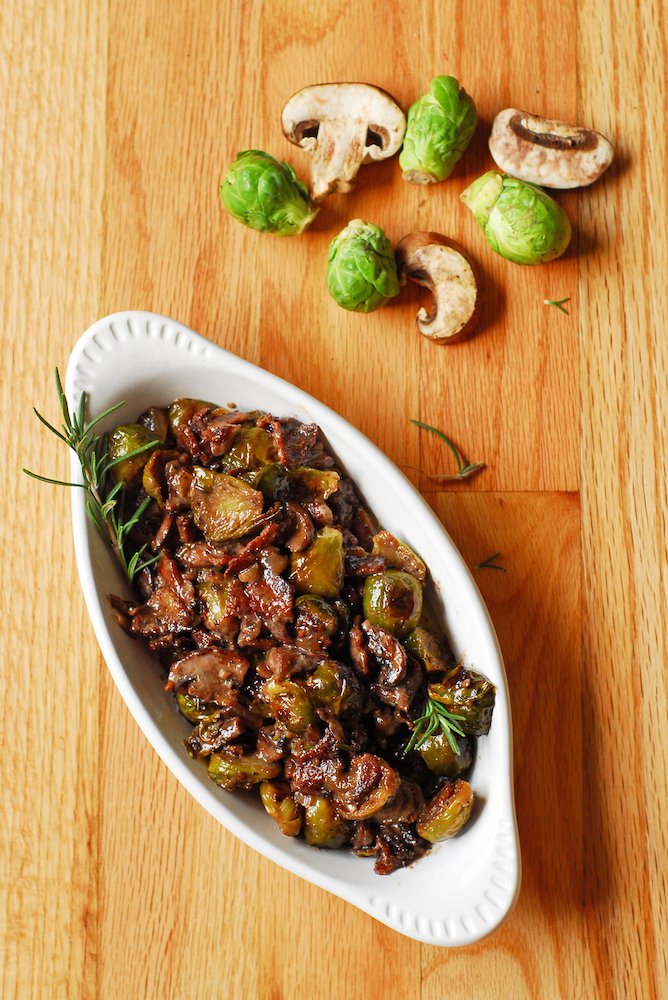 Brussels Sprouts and Mushrooms in Rosemary Red Wine Cream Sauce from A Duck's Oven. Brussels sprouts, bacon, and mushrooms tossed together in a garlicky rosemary red wine cream sauce. A great way to liven up these veggies!