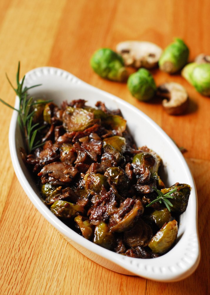 Brussels Sprouts and Mushrooms in Rosemary Red Wine Cream Sauce from A Duck's Oven. Brussels sprouts, bacon, and mushrooms tossed together in a garlicky rosemary red wine cream sauce. A great way to liven up these veggies!