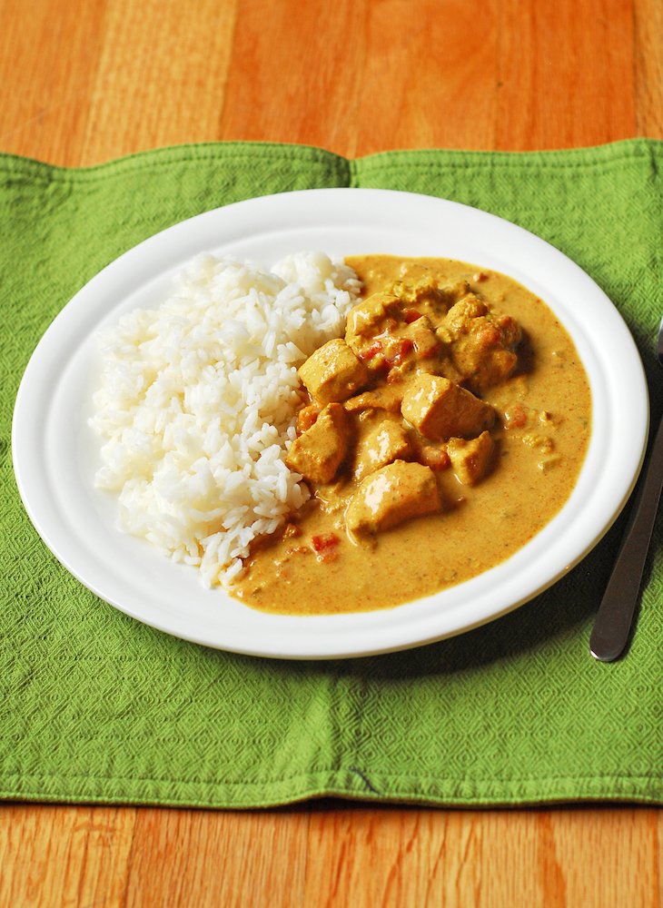 Crockpot Coconut Chicken & Veggie Curry from A Duck's Oven. A simple and flavor-packed curry made easy in your crockpot!