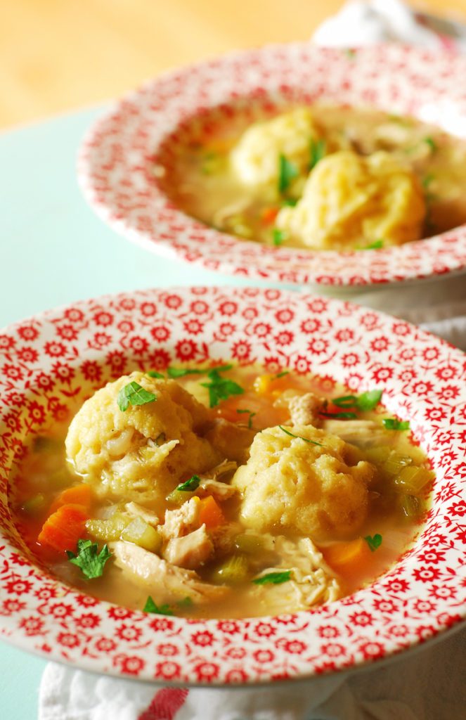 Portuguese Chicken Soup with Dumplings from A Duck's Oven. Simple chicken soup with cheesy, fluffy dumplings, also known as bori bori soup.