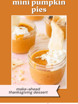 Mini sous vide pumpkin pies in small glass jars topped with whipped cream and a pie crust shard, with the text mini pumpkin pies and make-ahead thanksgiving dessert.