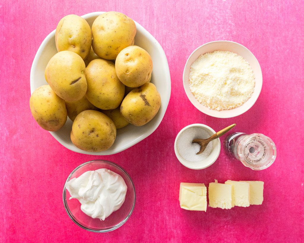 Mashed potato ingredients on hot pink background