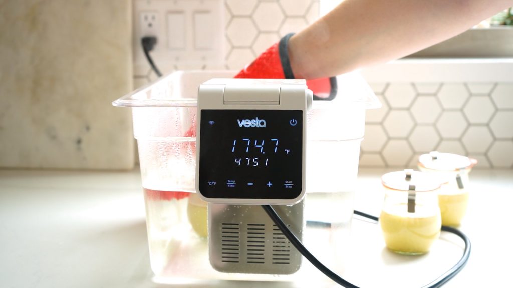 Adding jars to sous vide water bath