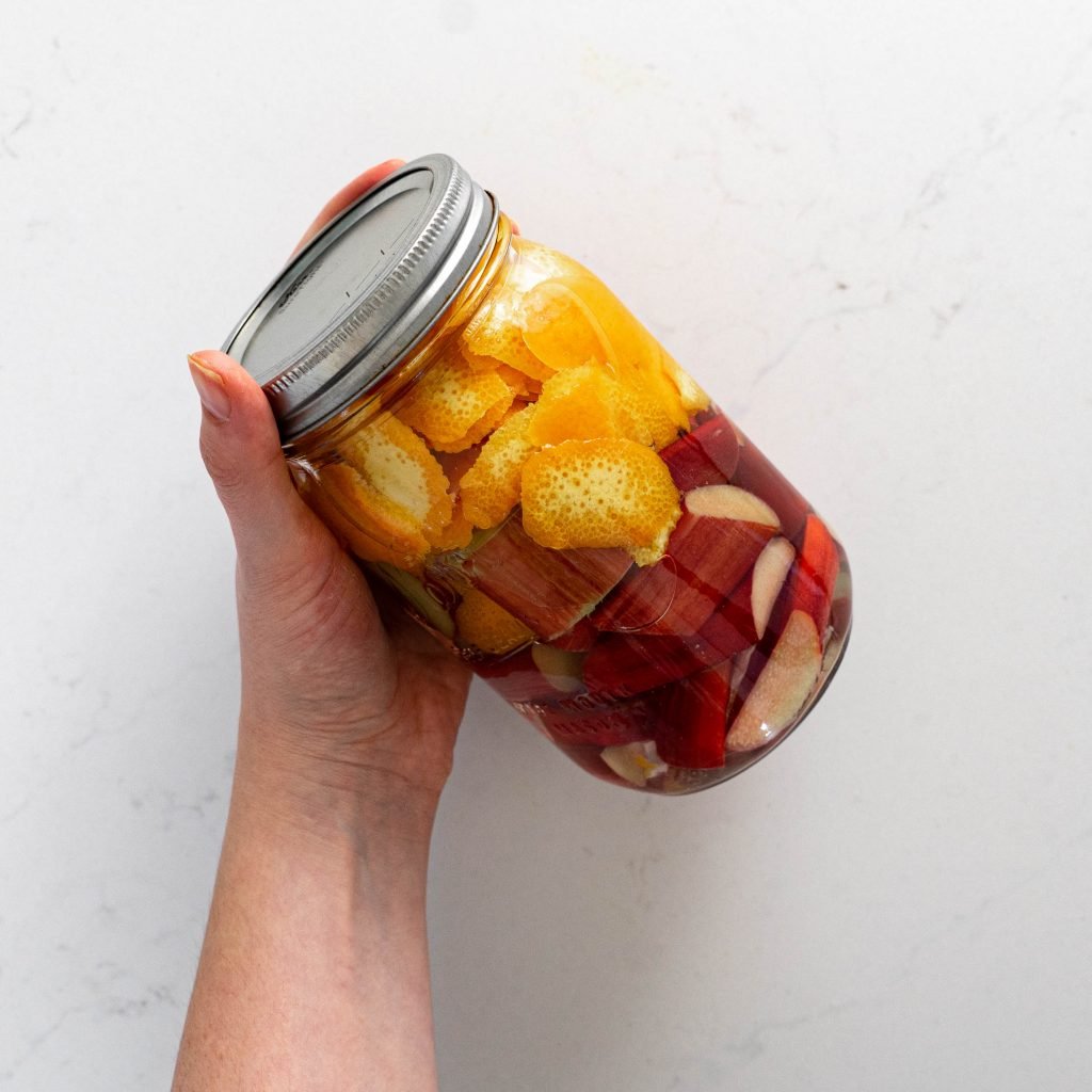 Jar of fruit and vodka before cooking