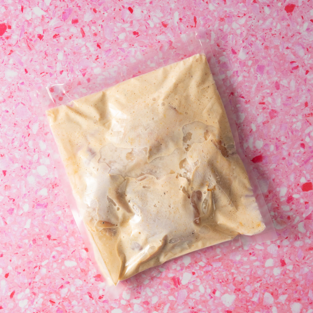 Buttermilk marinade and chicken in a chamber vacuum seal bag